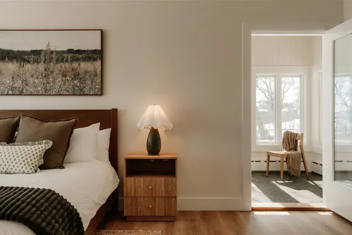 Access to warm sunroom from primary bedroom