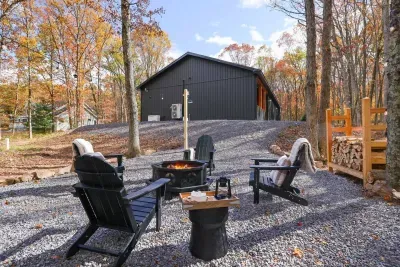 Tucked away in the woods is our firepit area ready for stargazing and s'mores!