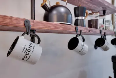 Every detail matters, including your morning coffee ritual. Sip from custom Pocono Barndominium mugs while planning your day of adventure near Jim Thorpe, hiking, and horseback riding.