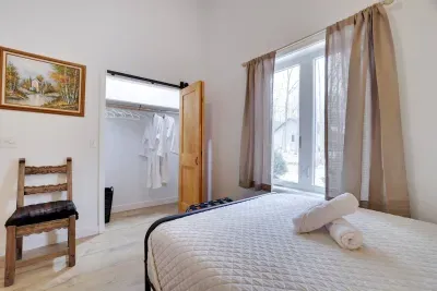 Relax in style with spacious closets and plush robes in every room. The Birch suite offers comfort and convenience at the Pocono Barndominium, an ADA accessible luxury rental minutes from Jim Thorpe hiking and horseback riding.