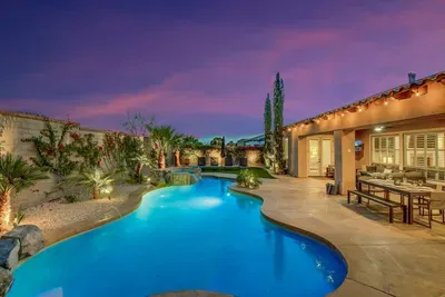 Heat it full with fountains and plenty of space to play and swim. Jacuzzi waterfalls into the pool. Large flat step allows for small kid play area.