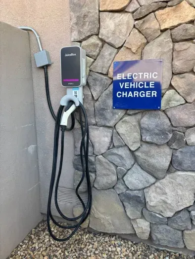 Electric vehicle charger available for all guests to use.