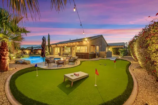 Mini golf, putt putt, cornhole, or other fun activities can happen in this great and spacious backyard.