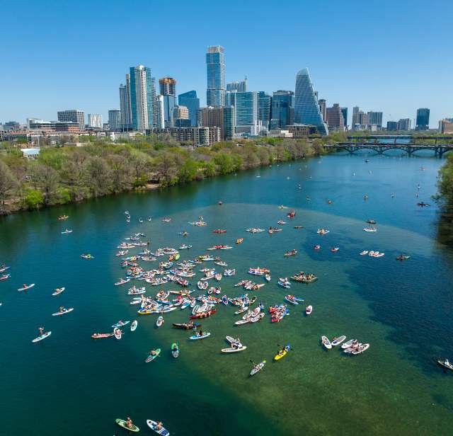 Lady Bird Lake kayaking aerial with Austin skyline