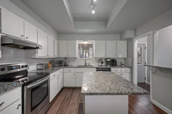 Spacious, fully stocked kitchen with plenty of counter space.  We provide both a Keurig coffee machine and a standard coffee pot.