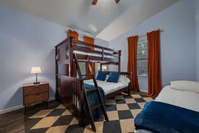 Third bedroom has a bunk bed and a twin bed.