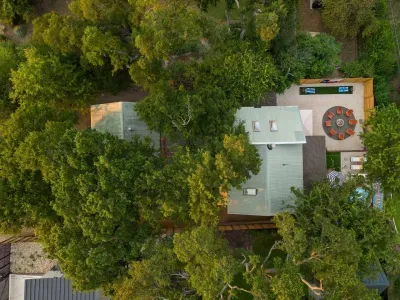 Two homes on the property and a super fun backyard with fire pit, games, lounge area, pool, weber grill and more!