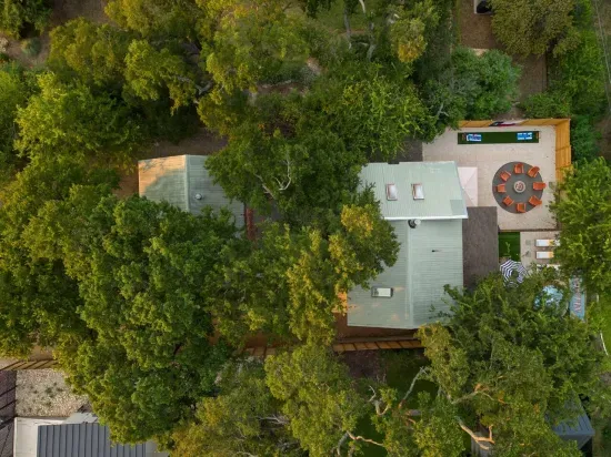 Two homes on the property and a super fun backyard with fire pit, games, lounge area, pool, weber grill and more!