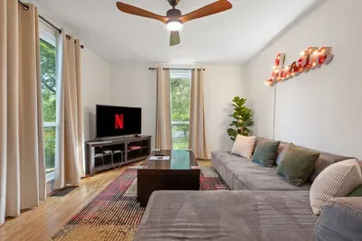 Bungalow living room with comfy sectional sofa.