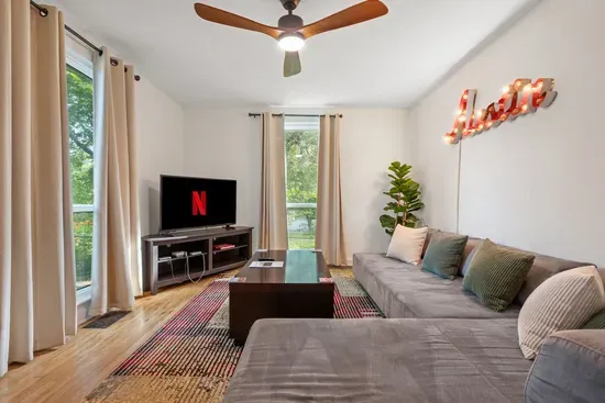 Bungalow living room with comfy sectional sofa.
