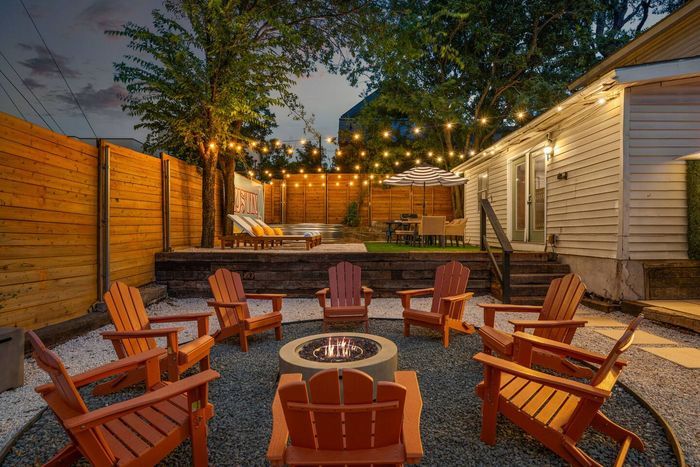 Austin bachelorette party house with outdoor fire pit and string lights - Double Down ATX