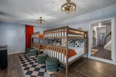 Two queen over queen bunk beds in the downstairs bedroom.