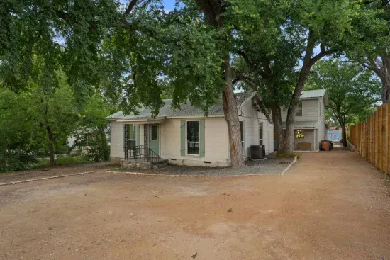 The front house is a cute bungalow with 3 additional bedrooms.  Separate from the bigger two story house in the back.