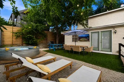 Great view of the outdoor TV from lounge chairs, cowboy pool, or outdoor tables!