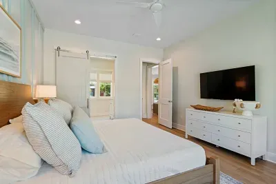 Bedroom 1, on the main floor with king size bed and en-suite bathroom.