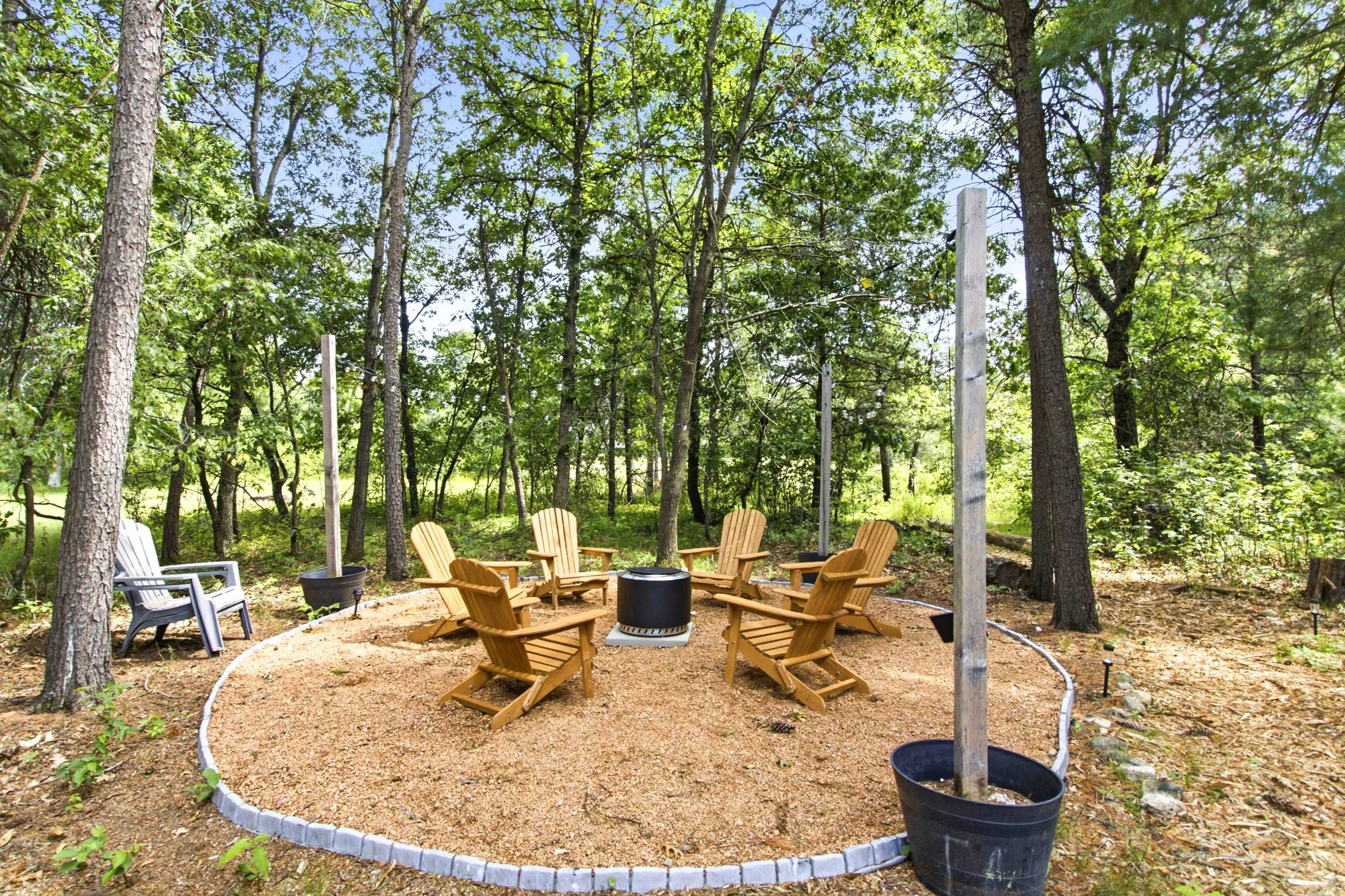 Property management Nekoosa, WI cabin backyard fire pit maintained by professional managers