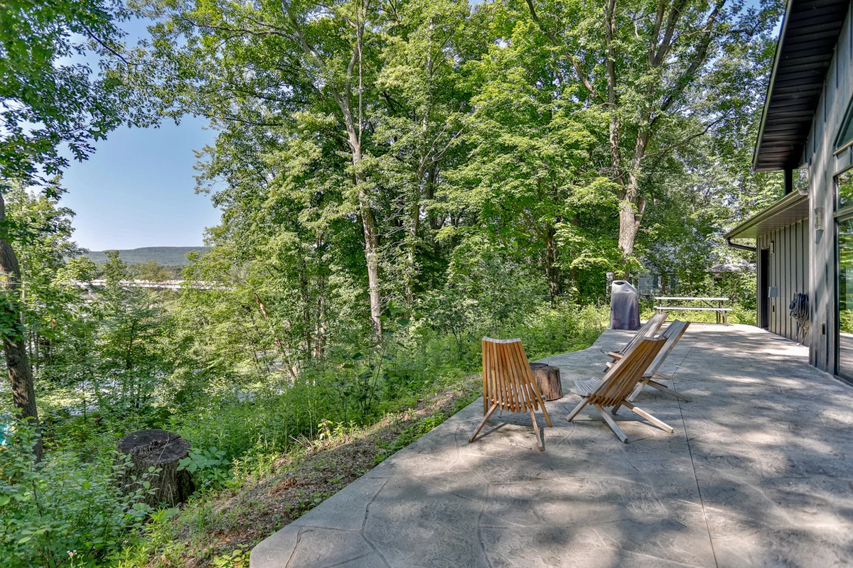 Wooded Northwoods Wisconsin cabin patio, a lodging base for things to do in Minocqua WI