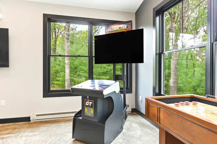 Bring out your competitive side with arcade golf and shuffleboard tucked beside peaceful wooded views—perfect for playful, laid-back downtime.