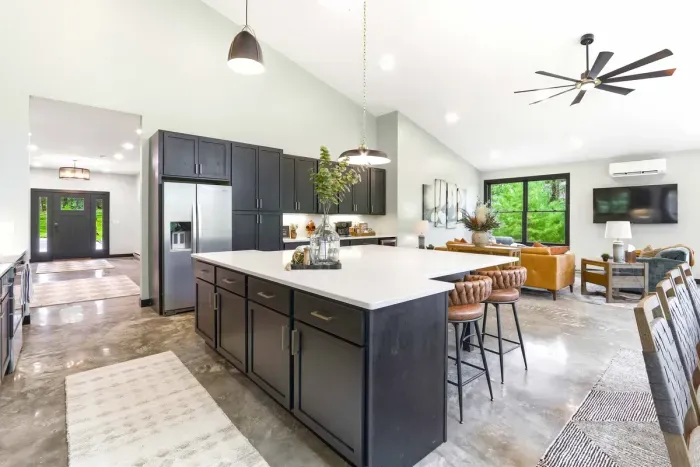 Move seamlessly from cooking to lounging in a bright, open-concept space designed for easy gatherings, cozy downtime, and effortless connection.