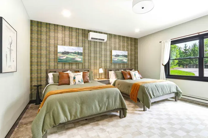 Rest comfortably after a day of adventure in a welcoming guest room designed for easy mornings, cozy nights, and shared stays.