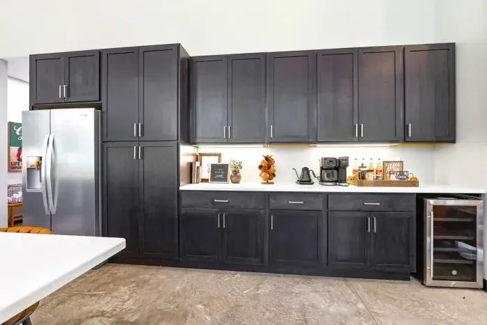 Savor slow mornings and easy entertaining with a stylish coffee bar, generous storage, and everything you need within reach.