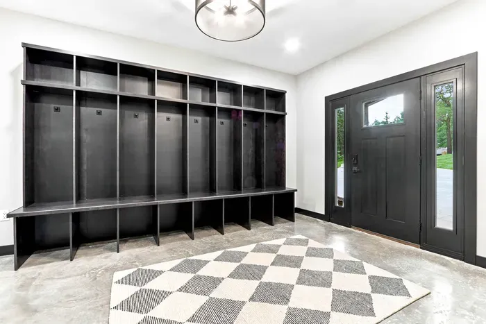 A bright welcoming entryway with built-in cubby storage makes settling in simple from the moment you arrive.