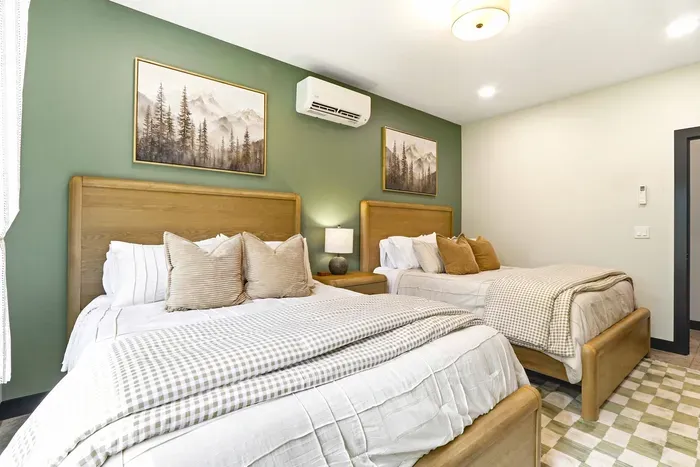 Settle into a peaceful guest room made for shared stays, slow mornings, and cozy nights surrounded by nature.