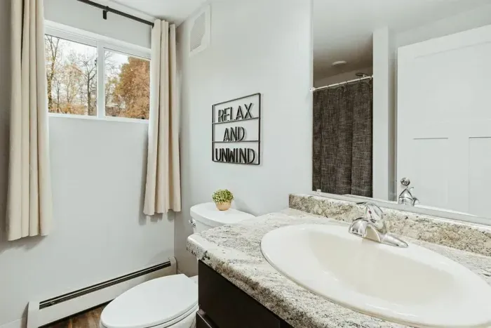 Modern amenities meet comfort – experience bliss in our well-appointed bathroom.
