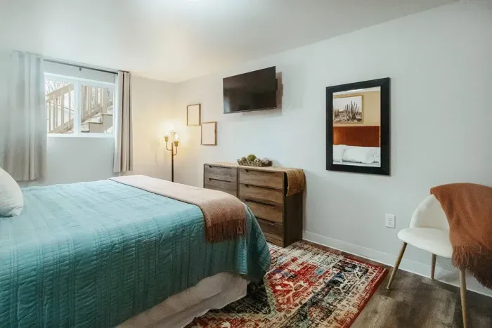 Your private sanctuary awaits – enjoy a restful night's sleep in our cozy bedroom.

King size bed
Television
