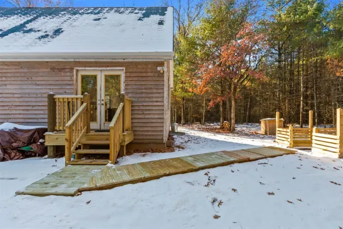 A peaceful outdoor area surrounded by vibrant greenery, creating a refreshing and scenic retreat.