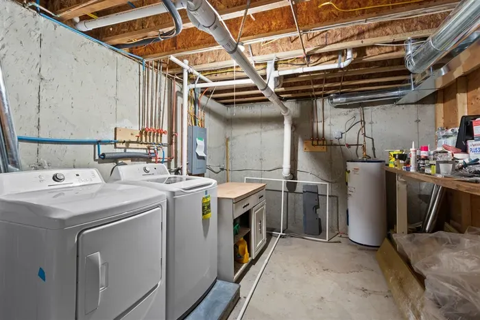 A convenient laundry area equipped with a washer and dryer, making it easy to keep clothes fresh during your stay.