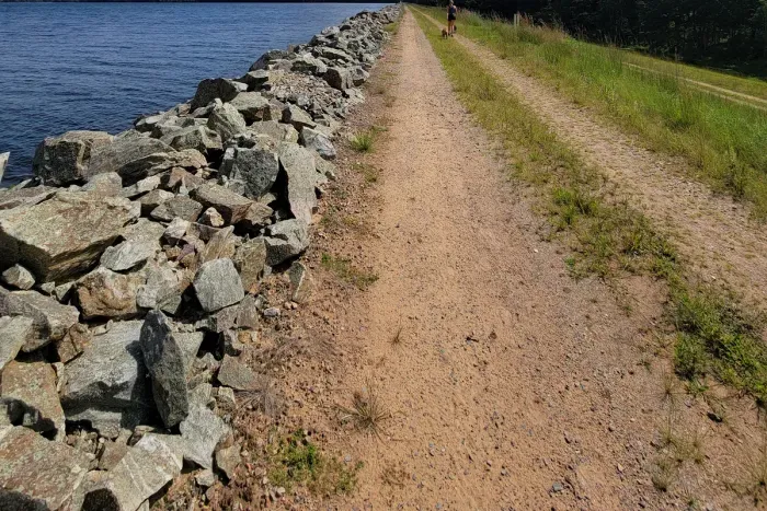 Take in wide-open lake views from a scenic waterfront trail, perfect for peaceful walks, fresh air, and big-sky moments.