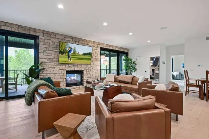 Bright living space filled w/ natural light and comfortable seating