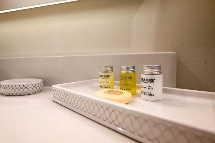 Clean vanity setup w/ neatly arranged essentials