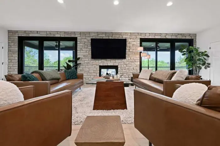 Sunlit seating nook facing large windows for a bright, open feel