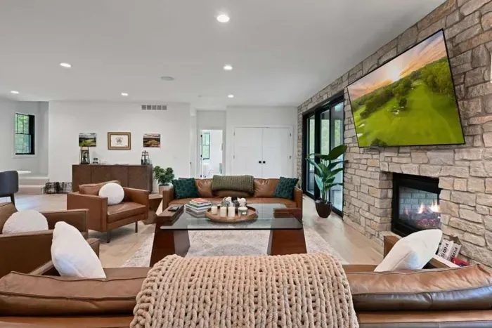 Welcoming living area w/ layered textures and a homey vibe