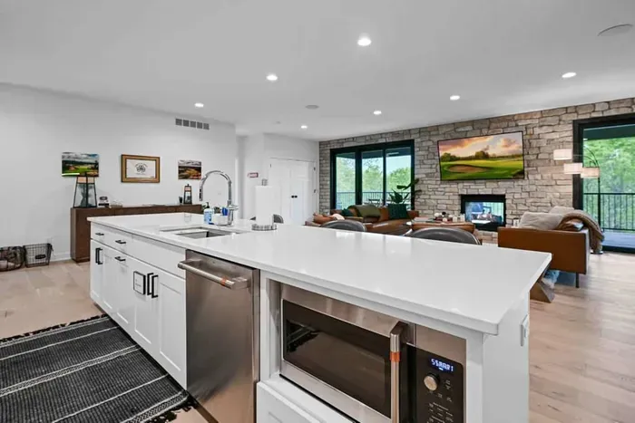 Bright, modern kitchen w/ generous counter space and seating