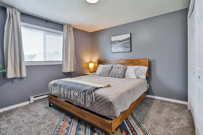 Luxurious master bedroom with a king-size bed for ultimate comfort