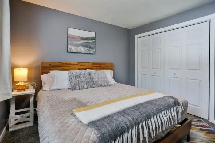 Luxurious master bedroom with a king-size bed for ultimate comfort