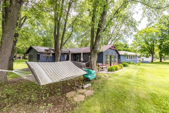 Quiet lakeside retreat in Nekoosa, WI with open space and beautiful surroundings.