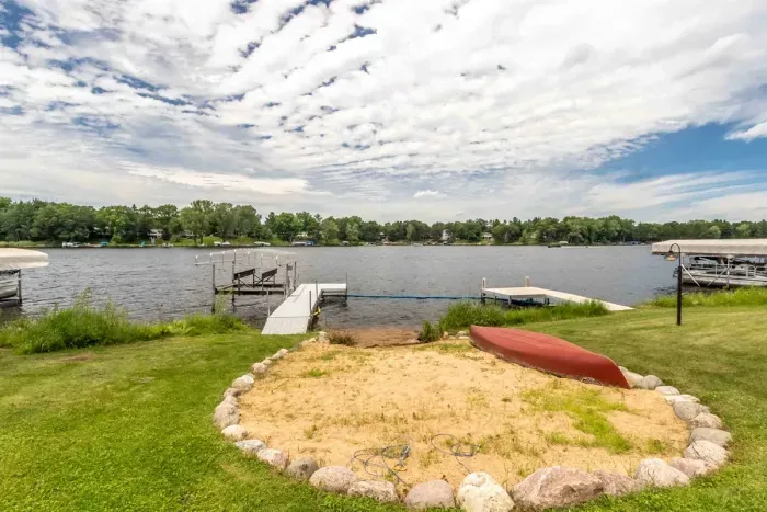 Waterfront cabin retreat in Nekoosa, WI with spacious yard and peaceful Northwoods setting.