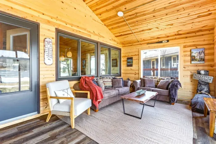 Airy Sun Porch with Side Table & Scenic Window Views