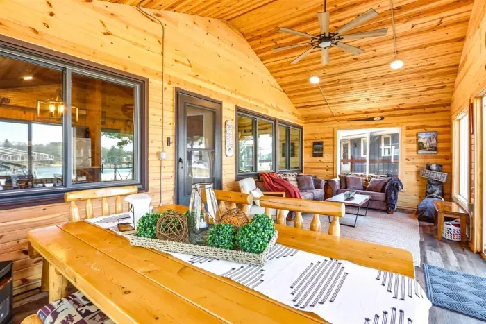 Charming Sunroom with Large Windows & Relaxing Seating