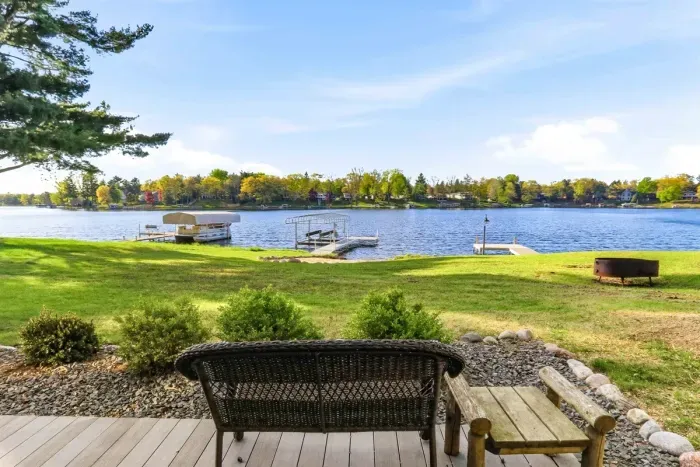 Inviting waterfront lawn with peaceful views across the lake and convenient access to boating or relaxing by the water.