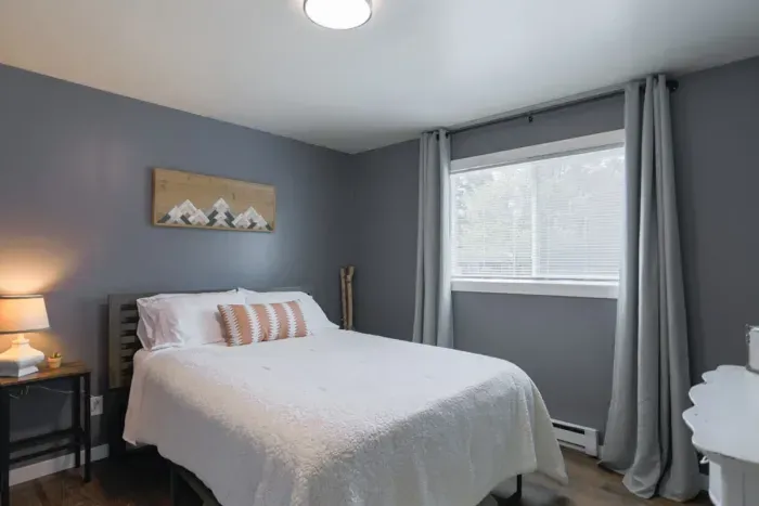 Luxurious master bedroom with a king-size bed for ultimate comfort