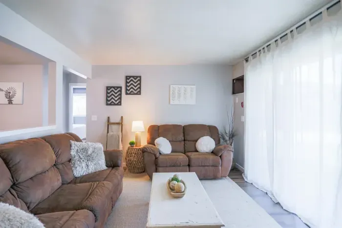 Spacious living room with elegant decor and views