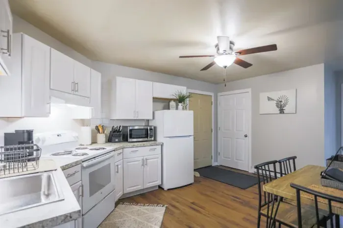 Modern kitchen with high-end appliances and light