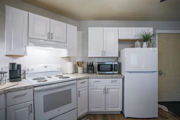 Modern kitchen with high-end appliances and light