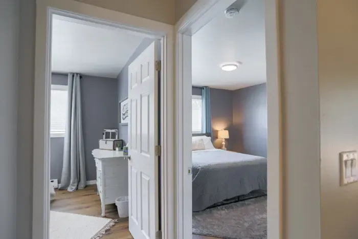 Luxurious master bedroom with a king-size bed for ultimate comfort