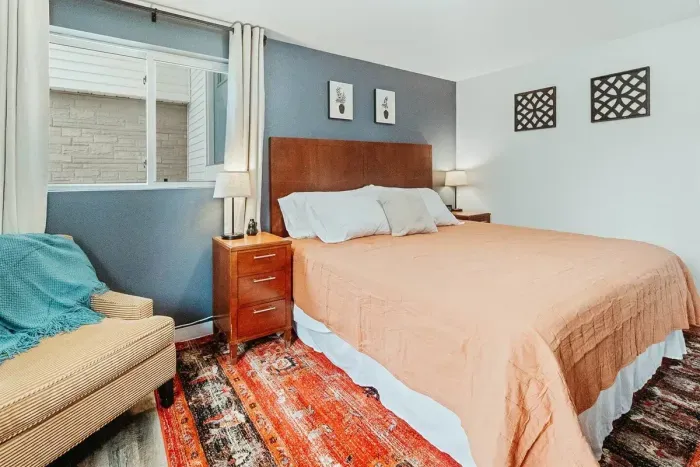 Your private sanctuary awaits – enjoy a restful night's sleep in our cozy bedroom.

Queen Bed
Soft Sofa
